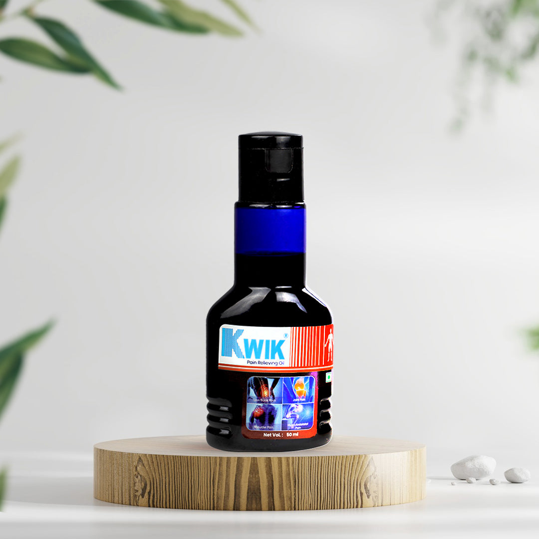 Kwik Pain Relief oil bottel with branding