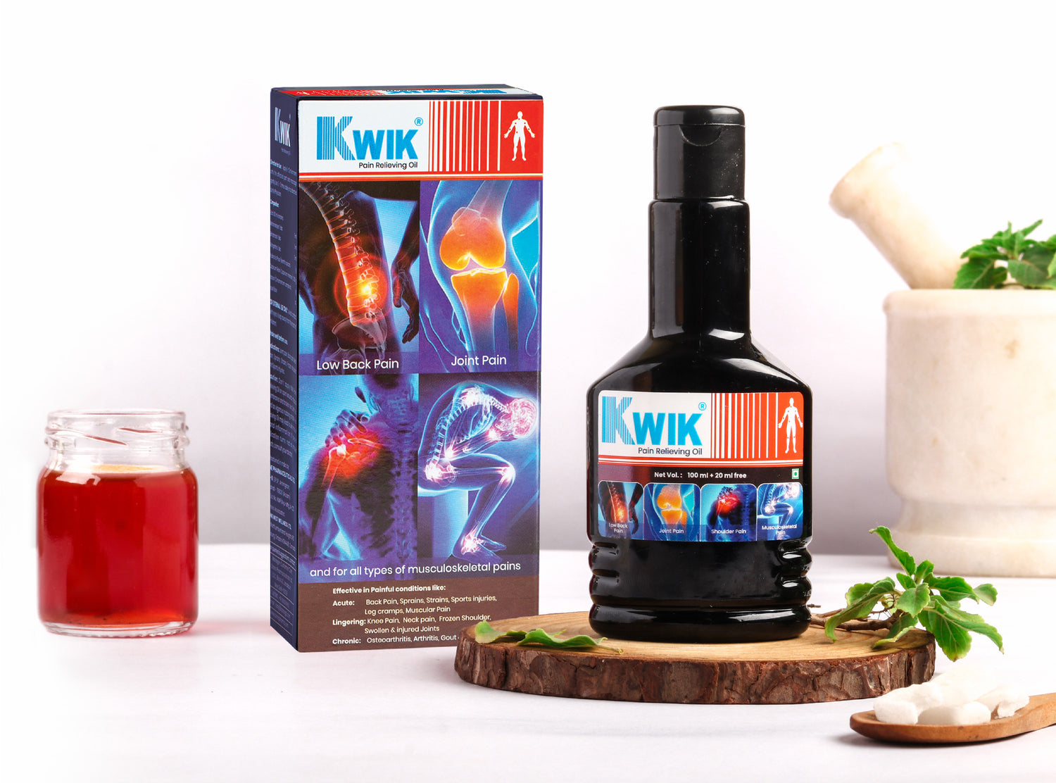 Kwik Pain Relief oil bottel with branding, featuring the product name and logo.